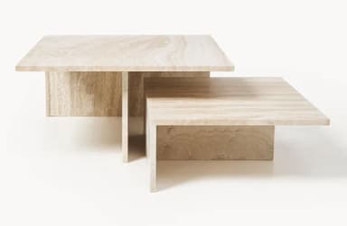 A tiered coffee table constructed from travertine stone, featuring a lower shelf and a higher, larger top surface. The design is geometric and minimalist, with the natural veining of the stone prominently displayed. — 3D model