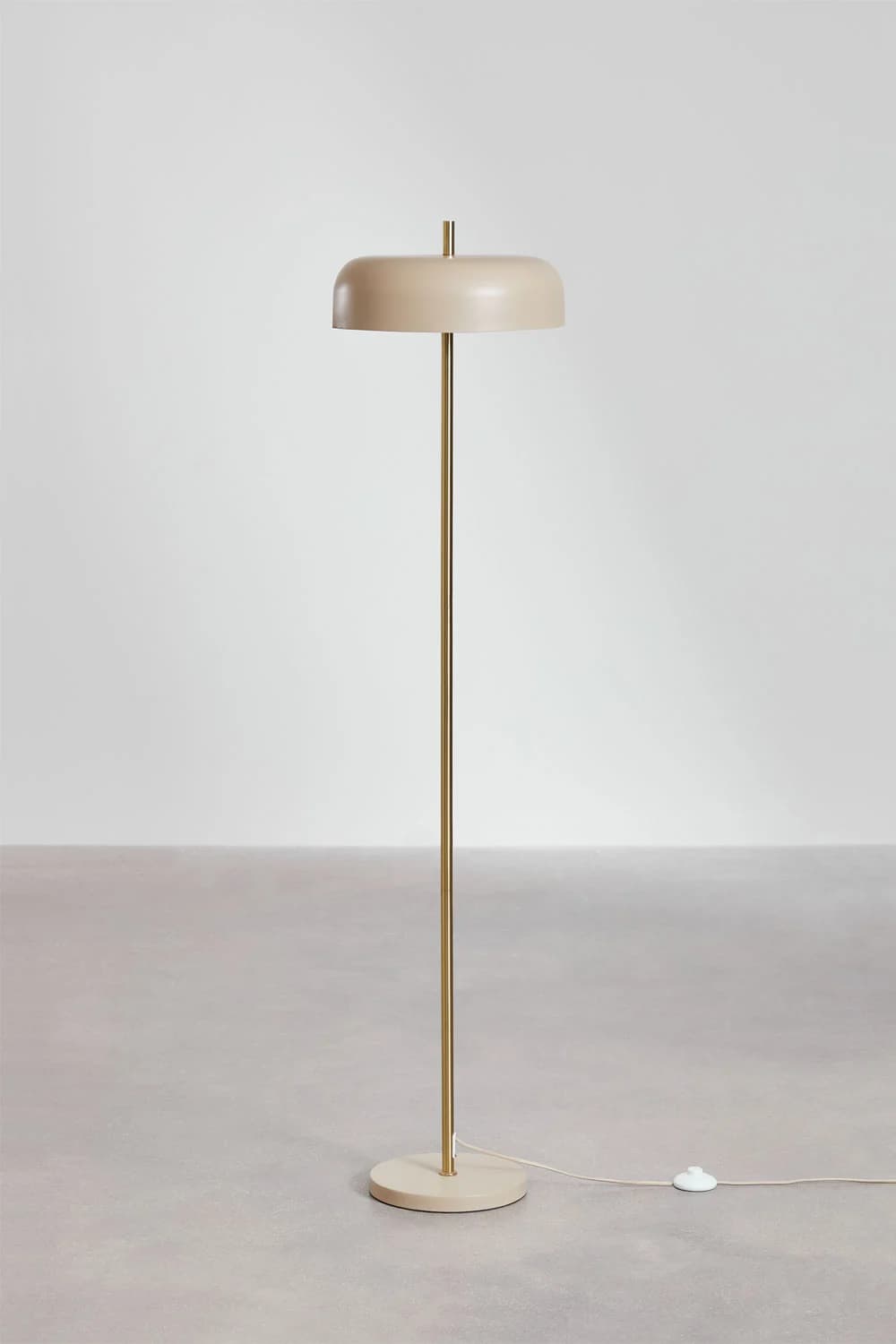 A modern floor lamp with a disc-shaped shade atop a slender, straight pole. The lamp stands on a circular base. The shade appears to be made of a light-colored material, possibly plastic or fabric, while the pole and base are metallic, likely brass or a similar golden-toned metal. — 3D model