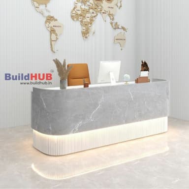 A modern, minimalist reception counter featuring a curved design. The upper section is made of a grey marble-effect composite material with subtle white veining. The lower section is fluted and appears to be backlit, casting a soft glow along the horizontal seam between the two sections. The counter has rounded edges and a low return on one end. — 3D model