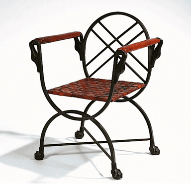 An armchair with a dark wrought iron frame, featuring an X-shaped base and curved supports. The seat is crafted from woven reddish-brown leather strips. The backrest is circular with a latticework design. The armrests have padded leather wraps, and the legs terminate in ornate paw feet. — 3D model