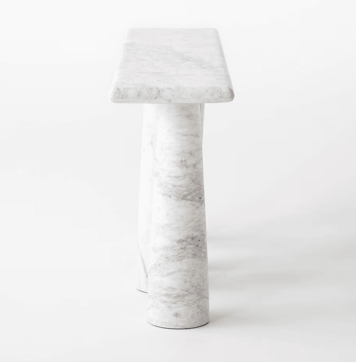 A minimalist and sculptural console table crafted entirely from white marble with subtle grey veining. The table features a rectangular top supported by a uniquely designed base consisting of organically curved or twisted marble pillars, giving it a solid and artistic appearance. The surfaces are polished, enhancing the natural beauty of the stone. — 3D model