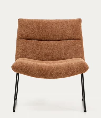 An armless lounge chair featuring a low-slung, ergonomic design. The chair is fully upholstered in a textured, terracotta brown fabric, with segmented cushions forming the backrest and seat. It rests on a minimalist black powder-coated metal sled base, giving it a contemporary aesthetic. The overall profile suggests comfort and relaxation. — 3D model