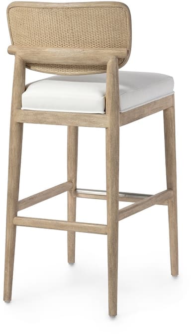 A modern bar stool featuring a light-toned wooden frame with a fully upholstered seat and a low backrest in white fabric. The frame has clean lines with rounded edges on the backrest. A silver-toned metal footrest is integrated into the front stretcher for added comfort and durability. The stool stands on four straight, tapered legs. — 3D model