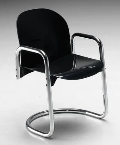 A cantilever armchair with a curved black seat and back, supported by a chrome-plated tubular steel frame. The frame forms a continuous loop for the base and extends upwards to create armrests and supports for the seat and back. The seat and back appear to be made of molded plastic or a similar material. — 3D model
