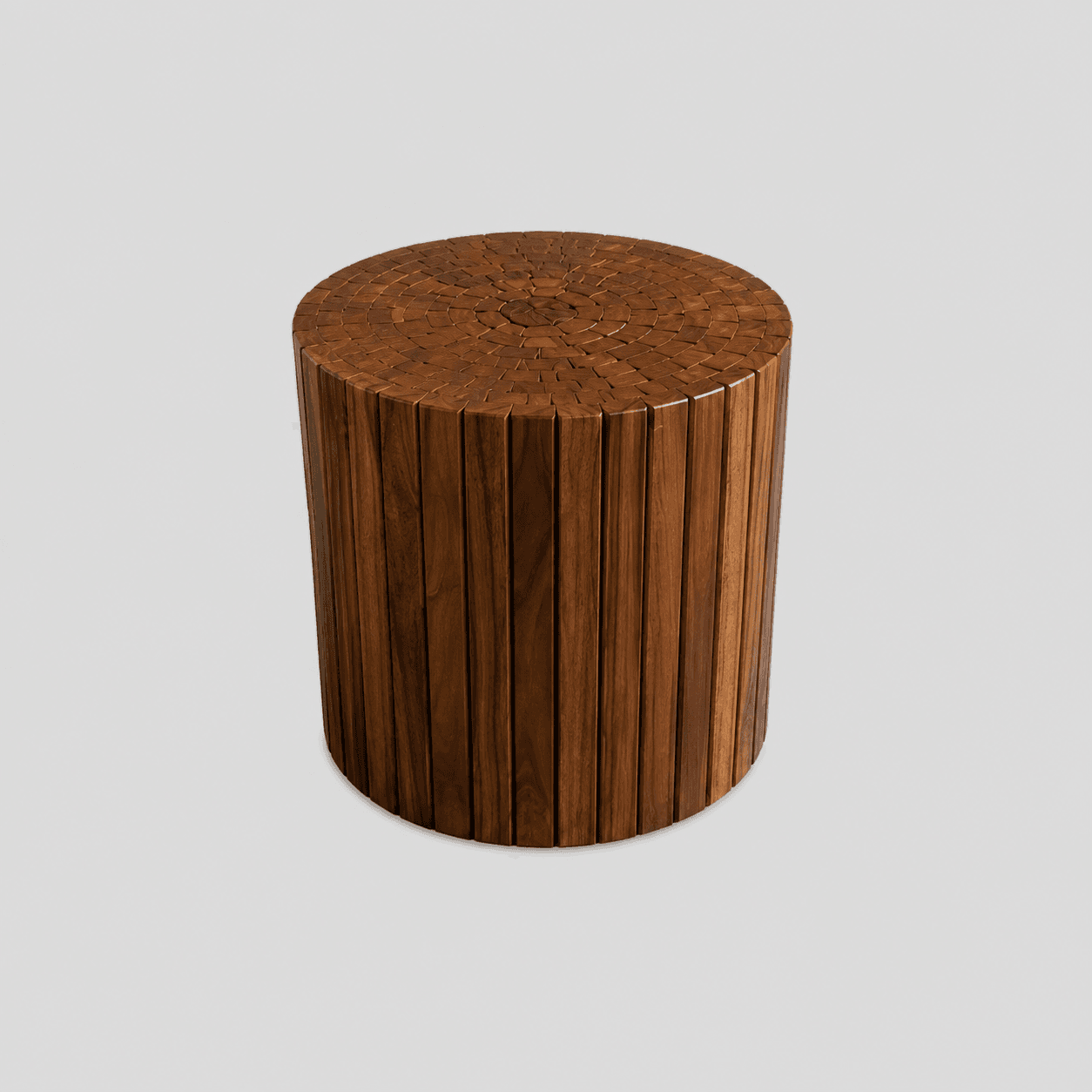 A cylindrical side table constructed from vertical wooden slats around its body, topped with a flat surface featuring a mosaic pattern of small, rectangular wood blocks arranged in concentric circles. The wood is a rich, medium-brown color with visible grain. — 3D model