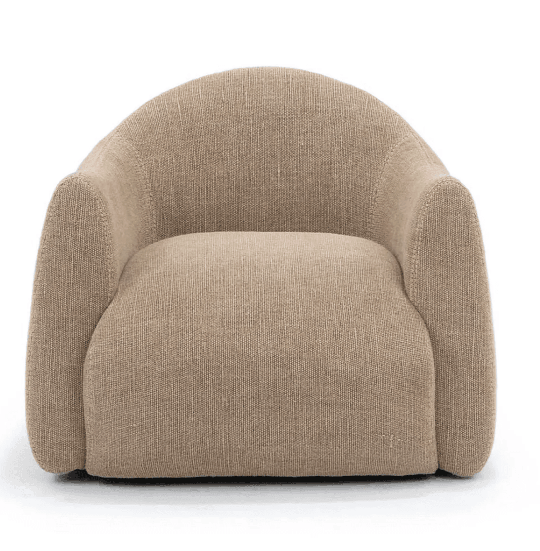 A compact accent chair with a rounded, high back that curves down to form armrests. The seat is wide and cushioned. The chair is upholstered in a textured, neutral-toned fabric with visible stitching along the edges of the armrests and back. — 3D model