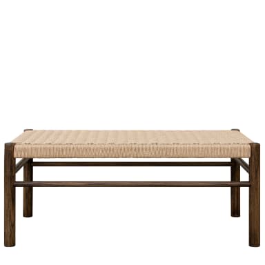 A minimalist bench featuring a dark stained wooden frame and a tightly woven natural fiber seat. — 3D model