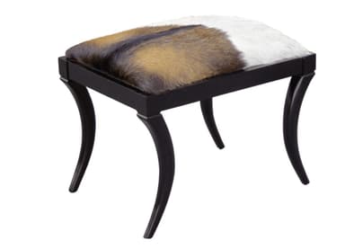 A small, rectangular stool featuring a cowhide upholstered top in natural brown, white, and black patterns, supported by four dark-finished, elegantly curved wooden legs in a cabriole style. — 3D model