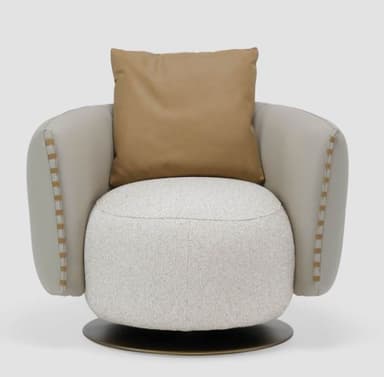 A modern, rounded swivel lounge chair featuring a distinctive two-tone upholstery and a dark metallic base. The exterior shell is smooth, light gray, while the interior cushioning is upholstered in a textured, off-white fabric. A separate tan lumbar pillow rests against the backrest. — 3D model