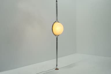 A modern floor lamp with a spherical, frosted glass shade suspended from a slender, metallic stem. The stem curves gracefully, cradling the shade. The lamp is supported by a round, wooden base, and a black power cord extends from the base. — 3D model