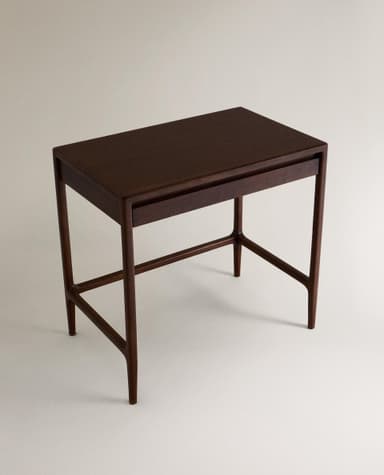 A minimalist dark wood writing desk featuring a rectangular top, a single shallow drawer, and four tapered legs connected by a stretcher base. — 3D model