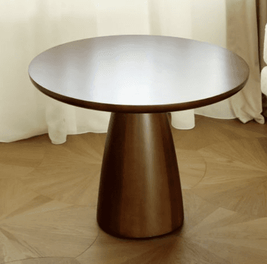 A modern round side table featuring a dark brown wood finish and a distinctive tapered pedestal base. — 3D model