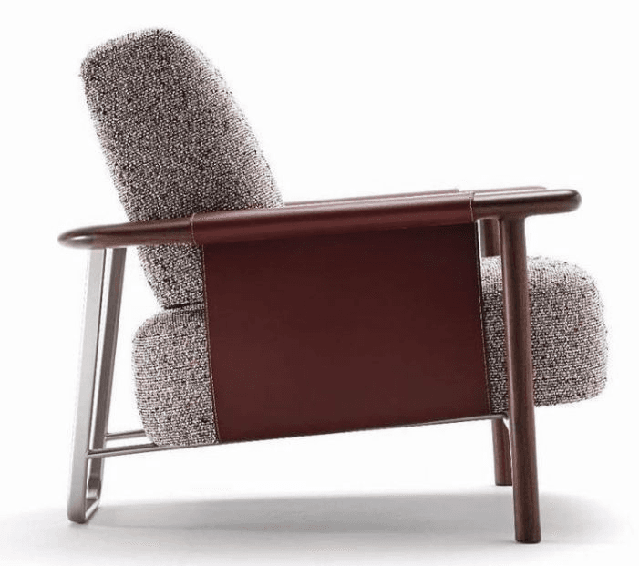 A contemporary lounge chair featuring upholstered seat and back cushions, a mixed-material frame combining wood and metal, and distinctive leather side panels. — 3D model