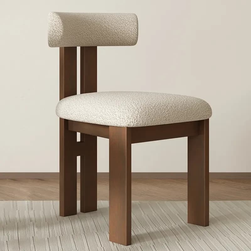 A modern dining chair featuring a solid wooden frame with block legs and a distinctive cylindrical bolster backrest. Both the seat and backrest are upholstered in a textured, off-white bouclé fabric, providing a soft contrast to the dark brown wood. The design is minimalist, emphasizing clean lines and robust construction. — 3D model