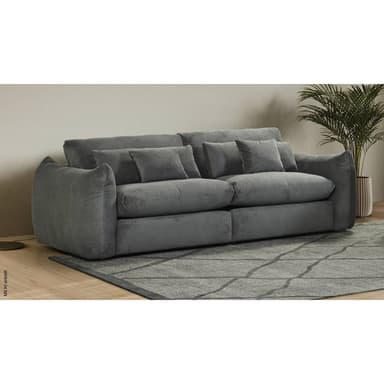 A modern three-seater sofa upholstered in textured grey fabric, featuring deep seat cushions, plush backrests, and four matching accent pillows. — 3D model