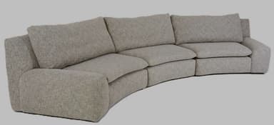 A contemporary, light grey upholstered modular sectional sofa featuring a distinct curved design. It consists of multiple segments with soft, plush seat and back cushions, and low, integrated armrests at each end. The fabric has a subtle texture, contributing to its modern aesthetic. — 3D model