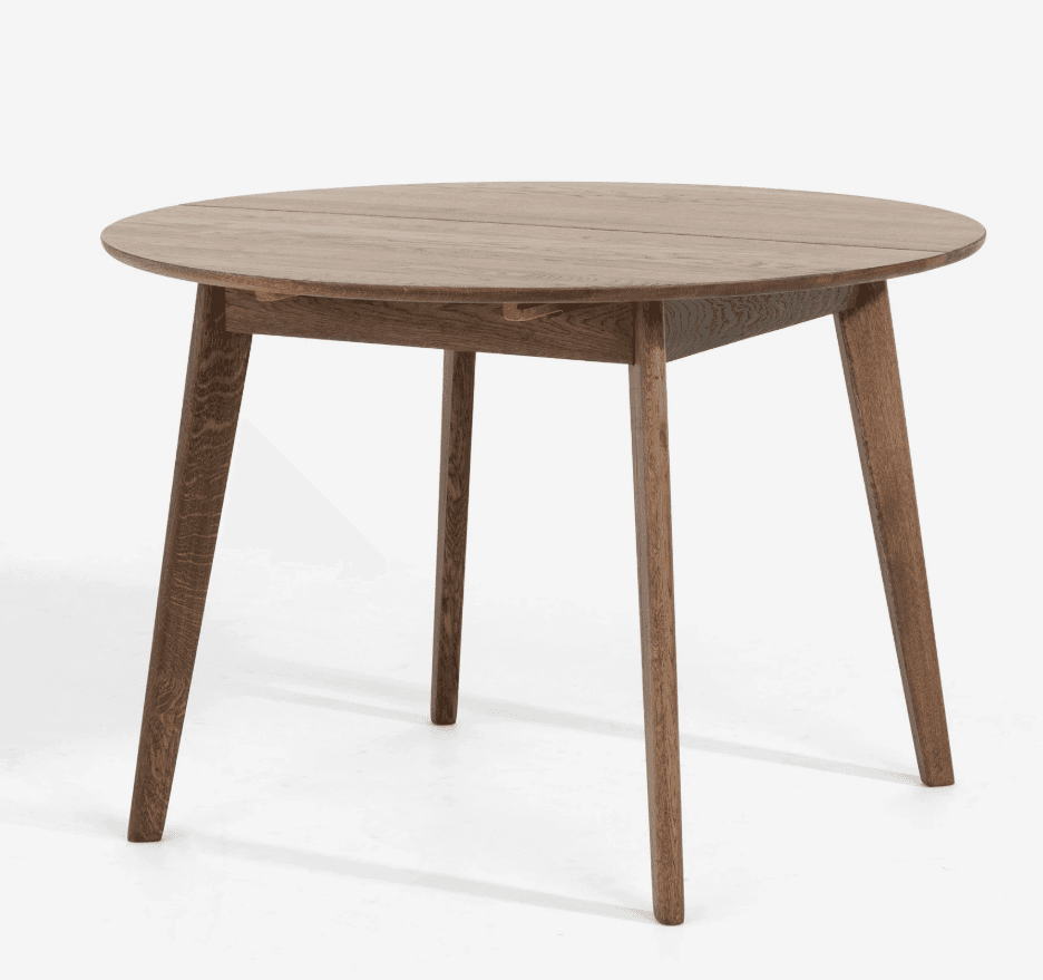 A round dining table with a natural wood finish. It features a split tabletop and four tapered legs. The design appears to be modern or mid-century inspired. — 3D model