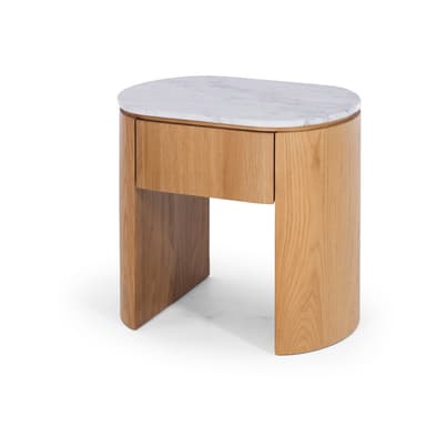 A modern and minimalist nightstand featuring a light-toned oak wood construction with a waterfall-edge design and an oval white marble top. It includes a single integrated drawer with a discreet, handleless design. The piece stands on two curved, solid wood legs that form the body of the nightstand. — 3D model