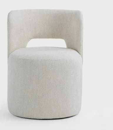 A contemporary fully upholstered barrel-shaped chair featuring a distinct curved back with a central rectangular cutout, covered in a light beige or off-white textured fabric. — 3D model