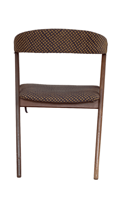 A wooden chair with upholstered seat and backrest. The upholstery features a repeating pattern of small, diamond-shaped motifs in a contrasting color. The frame appears to be made of wood with a dark finish. The chair has a simple, functional design. — 3D model