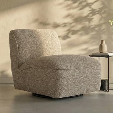 An armless lounge chair with a rounded, inviting silhouette, upholstered in a light-colored, textured bouclé fabric, set on a concealed swivel base. — 3D model
