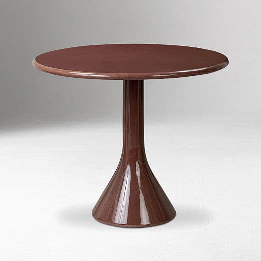 A round pedestal side table featuring a reddish-brown, speckled, high-gloss finish. The table has a circular top supported by a central column that flares out into a conical base, characteristic of a tulip-style or pedestal design. The surface appears smooth and reflective. — 3D model