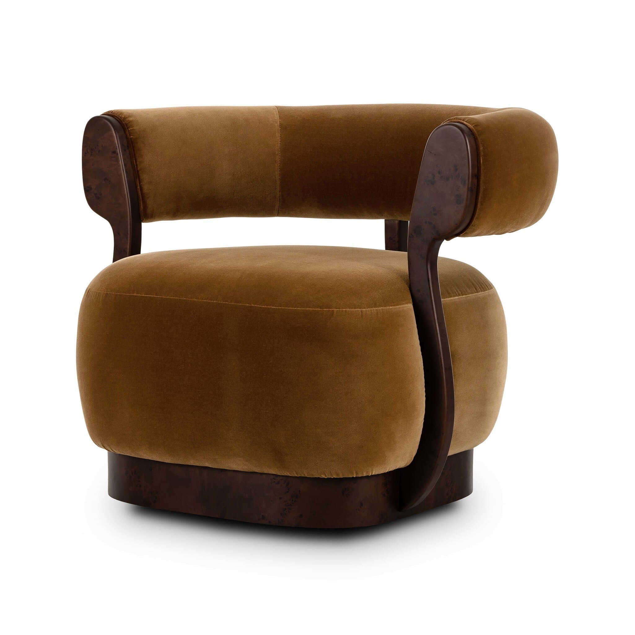 A plush armchair with a rounded silhouette, upholstered in a warm, brown velvet fabric. The armchair features curved wooden armrests and a wooden base. The upholstery is segmented on the backrest. — 3D model