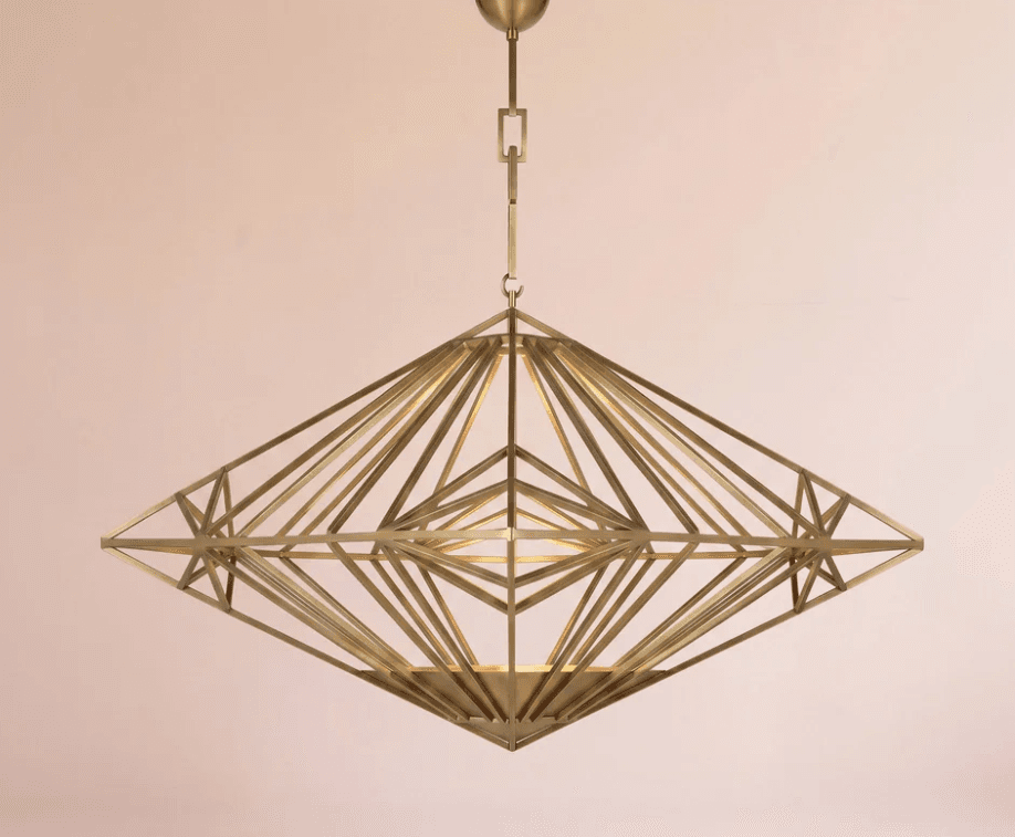 A striking chandelier featuring a complex, diamond-shaped external frame constructed from brass rods. The internal light source is diffused by a conical or pyramidal frosted glass or acrylic element. The entire fixture is suspended by a chain and canopy, all in a matching brass finish, creating a sophisticated and architectural lighting piece. — 3D model