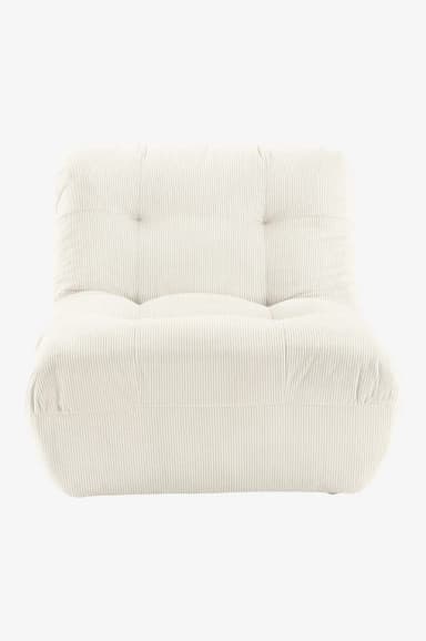 A low-profile armchair upholstered in cream-colored corduroy fabric. The armchair features a tufted backrest and seat, with plush, rounded armrests that seamlessly integrate into the base. The corduroy material exhibits distinct vertical ribbing, contributing to its textured appearance. The overall design is modular and contemporary, emphasizing comfort and a relaxed aesthetic. — 3D model