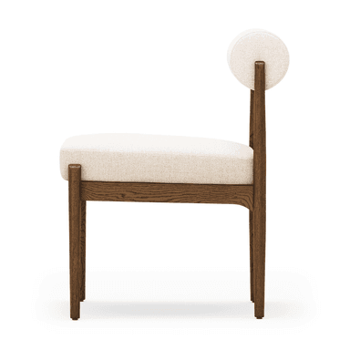 A modern armchair with a wooden frame and upholstered seat and backrest. The frame is constructed from dark stained wood, featuring four legs and a supportive structure for the seat. The seat is generously padded and covered in a textured, off-white fabric. The backrest is a distinct circular cushion, also upholstered in the same off-white fabric, supported by a slender wooden upright extending from the rear of the seat frame. — 3D model
