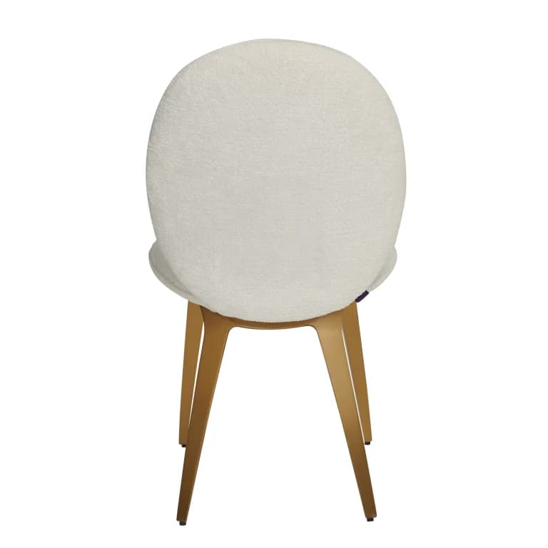 A contemporary accent chair featuring a rounded, upholstered back and seat in cream bouclé fabric, supported by splayed gold-tone metal legs. — 3D model