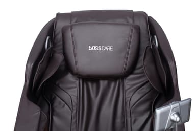 A sophisticated full-body electric massage chair, featuring a contemporary ergonomic design. It is upholstered in dark brown synthetic leather with contrasting lighter brown fabric accents on the inner cushioning and footrest area. The chair includes a robust base, integrated armrests, a built-in foot and leg massager, and a silver-colored control panel mounted on a flexible arm. Speaker grilles are visible near the headrest, indicating integrated audio capabilities. — 3D model