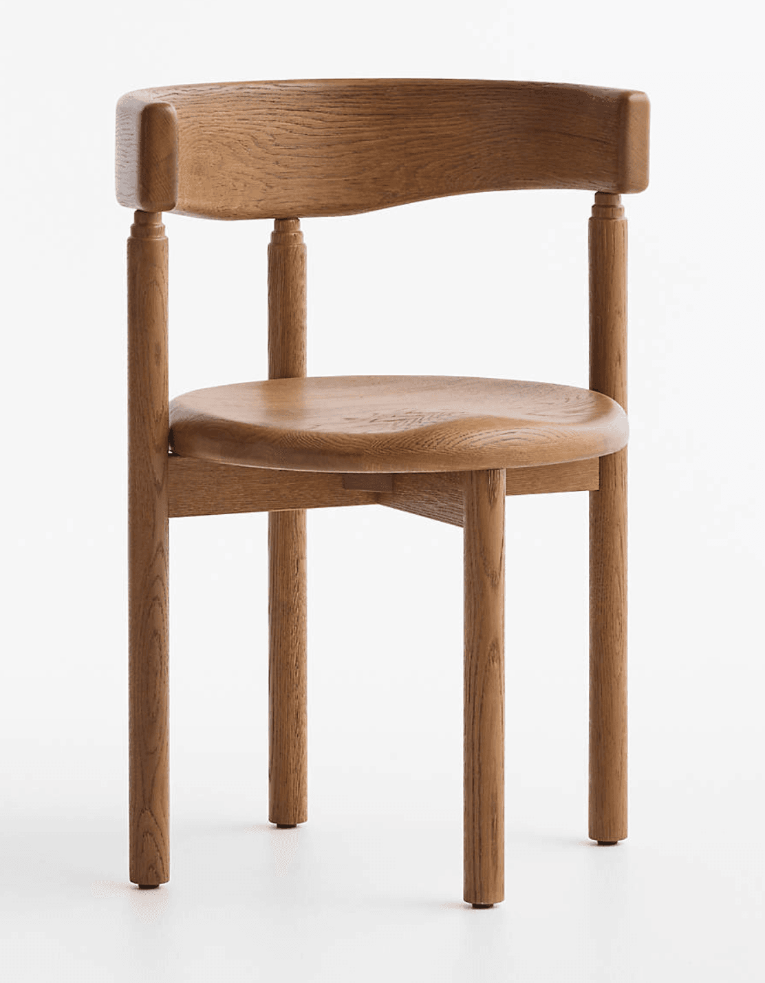 A modern dining chair constructed from light brown oak wood, featuring a gently curved backrest that integrates into short arm-like extensions. The seat is sculpted for comfort, and the four legs are round and tapered, without stretchers, giving it a minimalist aesthetic. — 3D model
