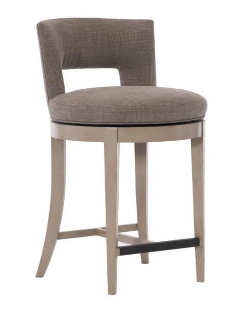 A contemporary upholstered swivel bar stool featuring a rounded seat and a distinctive backrest with a cutout. The stool is supported by four tapered wooden legs, reinforced with crossbars and an integrated metal footrest. The upholstery is a textured taupe or light brown fabric, and the wood frame has a light, possibly distressed or whitewashed finish. — 3D model
