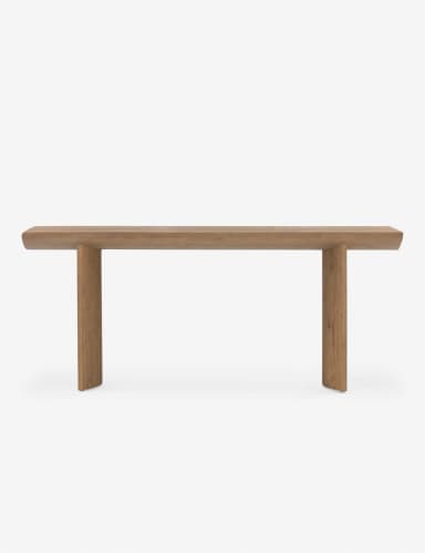 A long, narrow console table with a solid wood top and two block-like legs. The top has a gently curved edge on one side and a flat edge on the other. The legs are rectangular in shape and are positioned at the ends of the table. The wood grain is visible throughout the piece. — 3D model