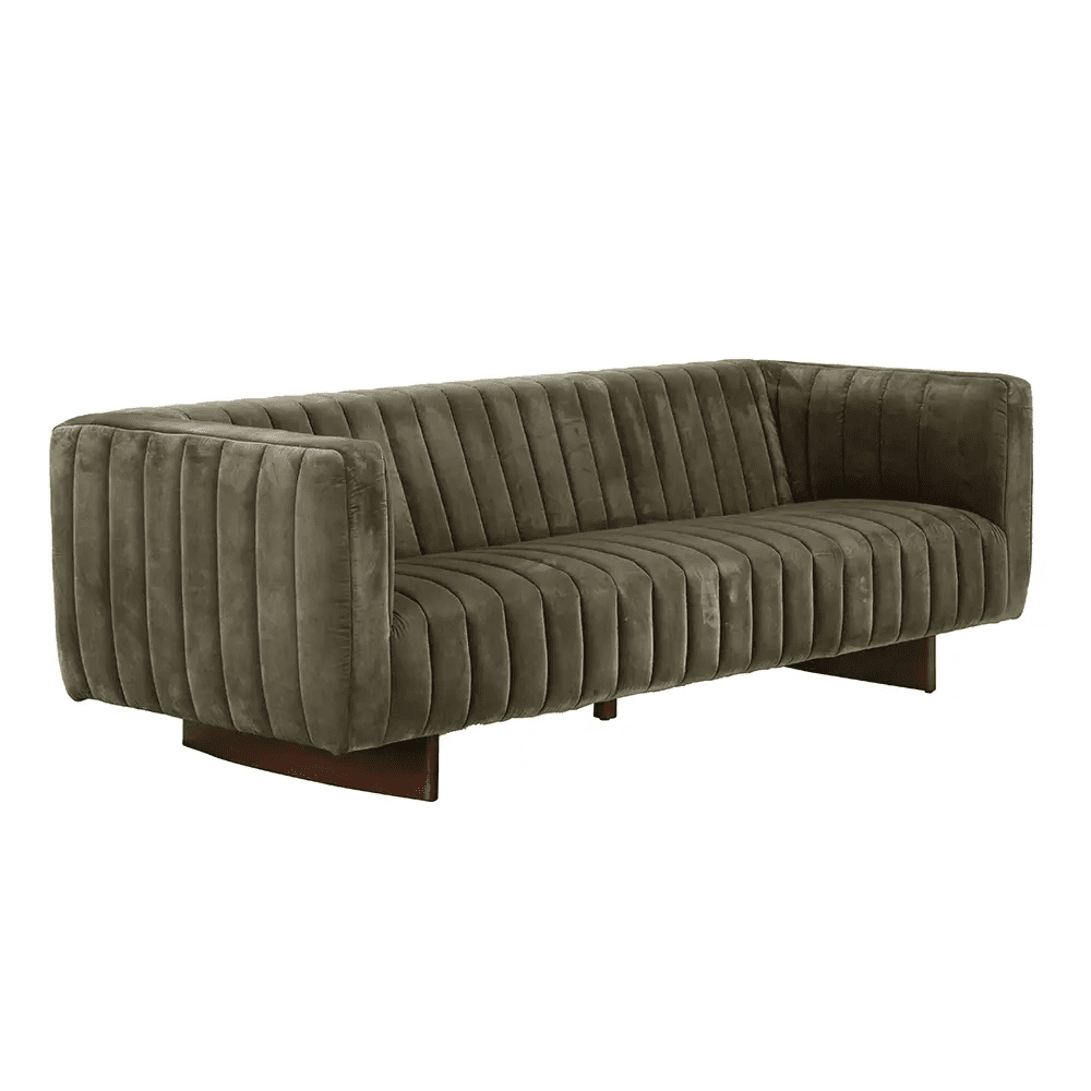 A three-seater sofa with a channel-tufted design. The sofa features a plush, velvet-like upholstery and a low-profile, rectangular silhouette. It is supported by a dark, wooden base. — 3D model
