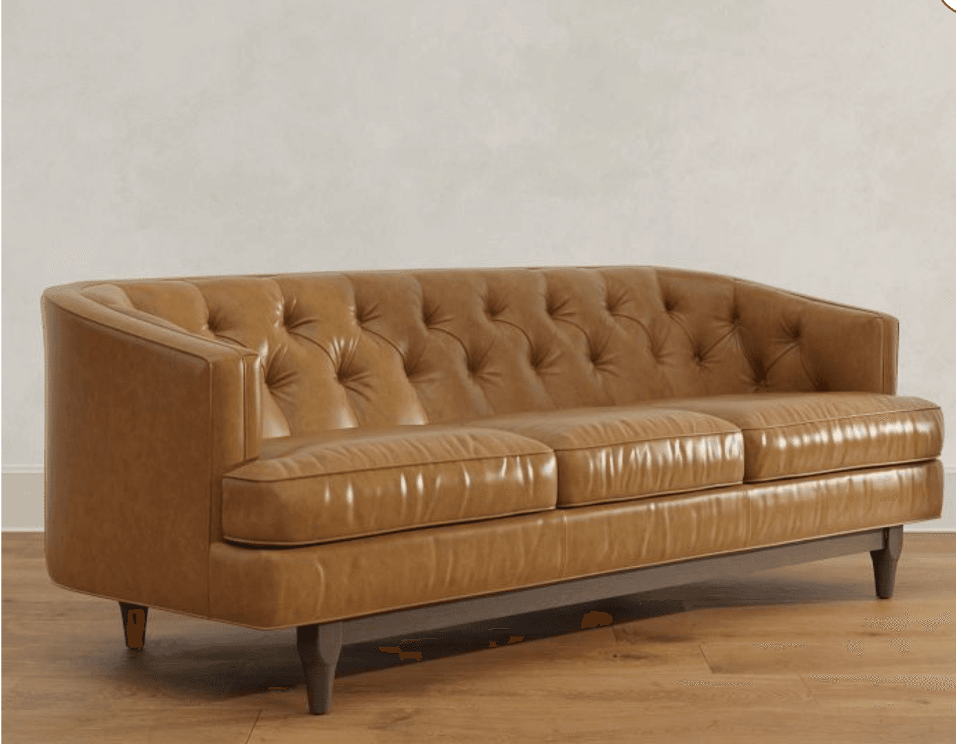 A three-seater sofa with a curved back and arms. The upholstery features tufted detailing on the backrest and seat cushions. The sofa is supported by four tapered wooden legs. — 3D model