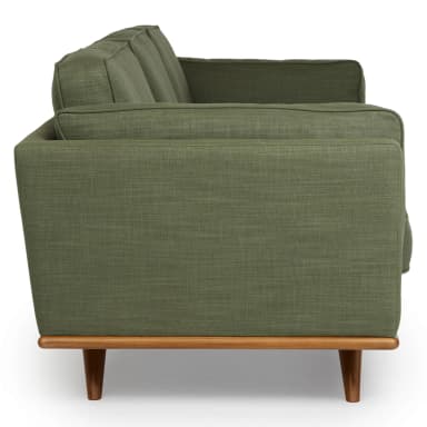 A sofa with a green, textured fabric upholstery. It features three back cushions and has a visible wooden base and tapered legs, suggesting a mid-century modern aesthetic. The overall construction appears to be upholstered with a supportive frame. — 3D model