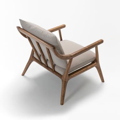 A modern lounge chair featuring a sturdy oak wood frame with gently curved armrests and tapered legs. The seat and backrest are fitted with thick, removable cushions upholstered in a light beige or grey fabric, providing a comfortable and inviting aesthetic. The design emphasizes clean lines and organic shapes. — 3D model