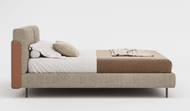 A contemporary upholstered bed frame with a rectangular headboard, featuring a textured fabric in a neutral tone. The bed has a low-profile platform base supported by slender metal legs. It is dressed with bedding including a duvet, a throw blanket, and pillows. — 3D model