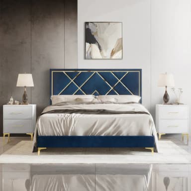 An elegant platform bed featuring a rich blue velvet upholstery across its frame and headboard. The headboard is adorned with a striking gold-finished metal overlay forming an intricate geometric, Art Deco-inspired pattern. The bed is supported by slender, tapered gold-finished legs, complementing the headboard accents. It includes white bedding, suggesting a complete bed setup. — 3D model
