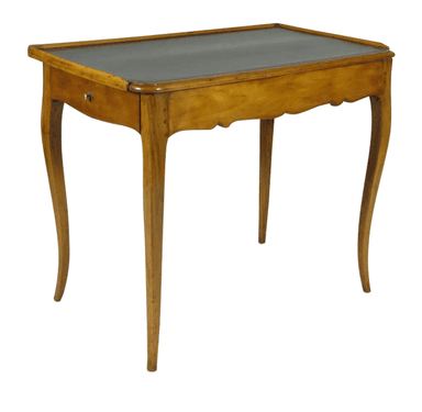 An antique or vintage Louis XV style writing table featuring a rectangular top inset with dark leather, a single small drawer with a brass pull, and elegant cabriole legs. The apron below the tabletop is subtly scalloped, adding to its decorative appeal. The wood has a warm, light brown tone with visible grain. — 3D model