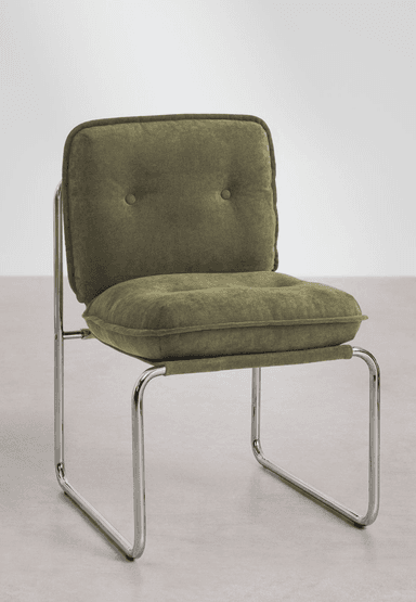 A modern cantilever chair featuring a continuous tubular chrome frame and light beige, textured bouclé-like fabric upholstery. The chair includes separate, plush seat and back cushions, with the backrest adorned with subtle button tufting. Its armless design and standard seat height make it suitable for dining or as an accent piece. Dimensions are provided, with an overall height of 87 cm and a seat height of approximately 50 cm. — 3D model