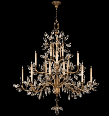 A multi-tiered chandelier with a gold-toned metal frame, designed to resemble branches with leaves. It features multiple candle-style lights and is adorned with clear, faceted crystal elements that mimic leaves and droplets. The overall aesthetic is ornate and nature-inspired. — 3D model