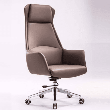 A modern high-back executive office chair upholstered in a smooth, light brown or taupe material, likely leather or faux leather. It features a five-star polished chrome base with dual-wheel casters, integrated armrests, and a prominent headrest cushion, suggesting ergonomic design for office use. — 3D model