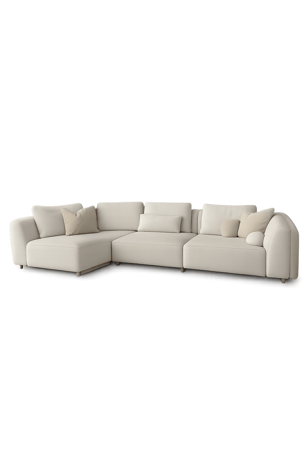 A modern, modular L-shaped sectional sofa upholstered in a light, neutral-toned fabric. It features a minimalist design with soft, rounded edges, low-profile wooden feet, and includes several loose throw pillows for added comfort and style. The sofa is composed of multiple configurable sections. — 3D model