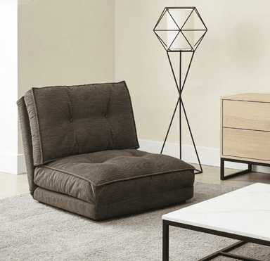 A low-profile, brown corduroy floor lounge chair featuring button-tufted detailing on both its seat and backrest, designed for casual, comfortable seating. — 3D model