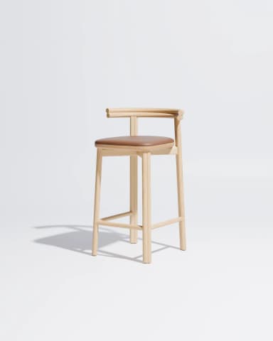 A minimalist bar stool constructed from light-toned oak wood featuring a subtly curved backrest that seamlessly transitions into the side supports. The frame consists of four slender, gently splayed legs connected by horizontal stretchers serving as footrests. A padded seat upholstered in brown leather provides contrast and comfort. The overall design emphasizes clean lines and natural materials, characteristic of Scandinavian or modern minimalist aesthetics. — 3D model
