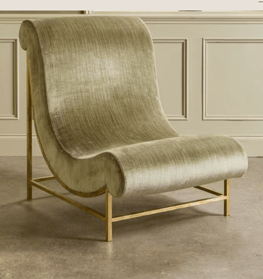 A modern lounge chair featuring a continuous, curved form upholstered in muted olive green velvet, supported by a minimalist gold-toned metal frame. — 3D model