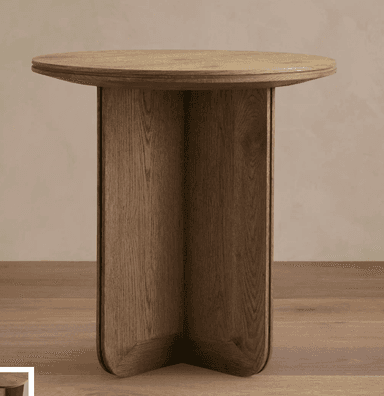 A wooden end table with a circular top and a cylindrical base supported by two intersecting vertical panels. The table has a natural wood finish. — 3D model